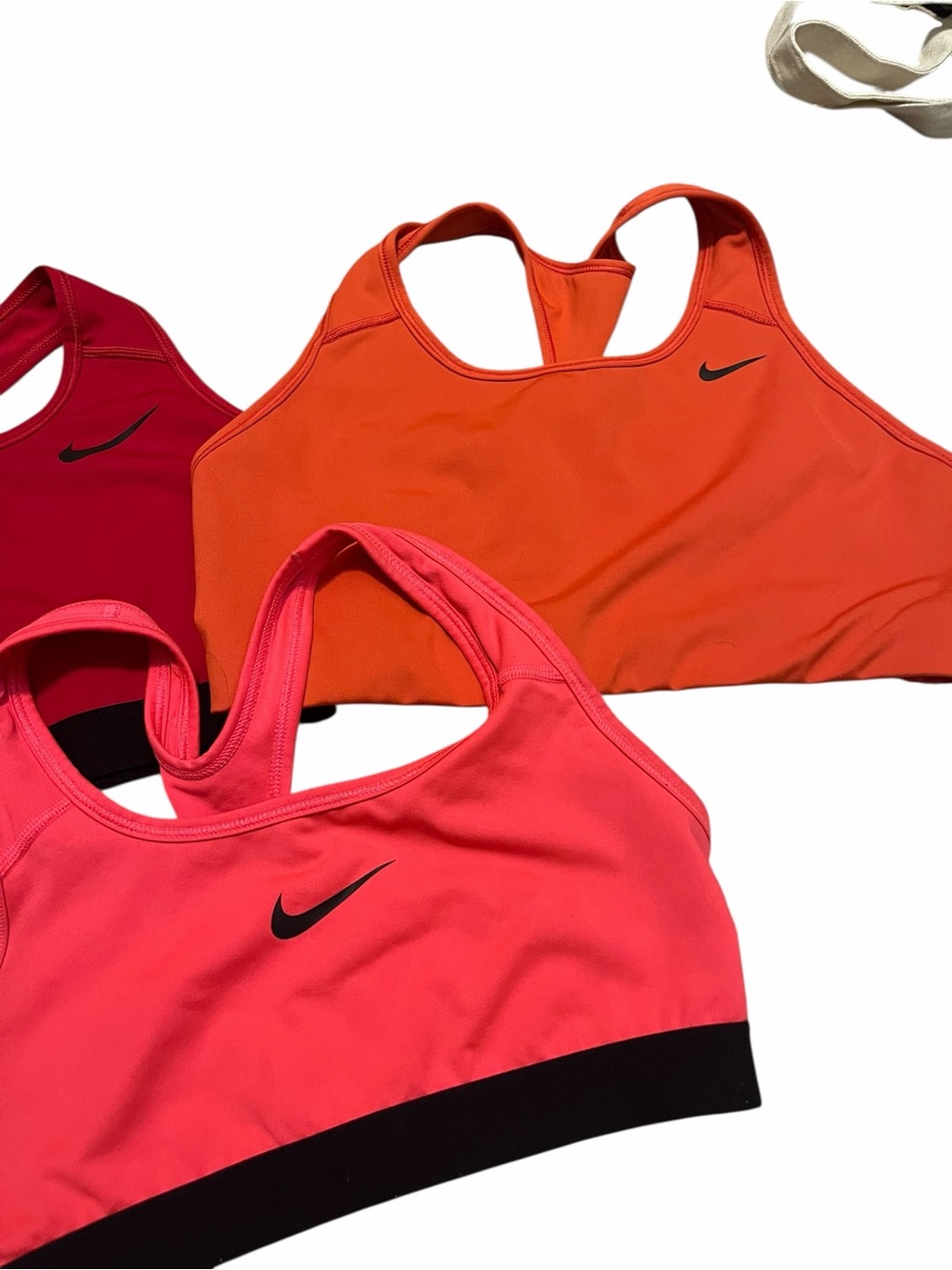 Nike Women’s Dri-FIT Racerback Sports Bra - Coral, Orange, Red